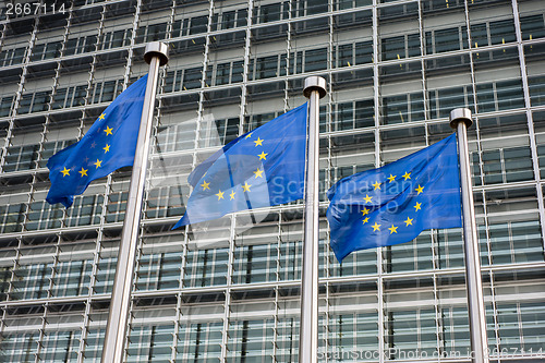 Image of European Union flags in front of the Berlaymont building (Europe