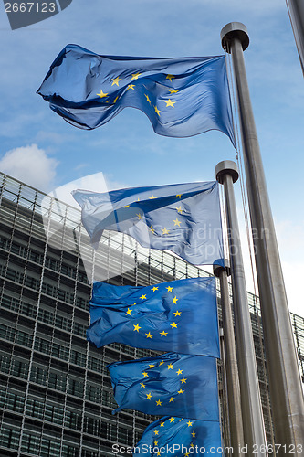 Image of European Union flags in front of the Berlaymont building (Europe