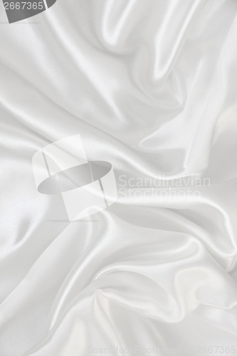 Image of Smooth elegant white silk as background 