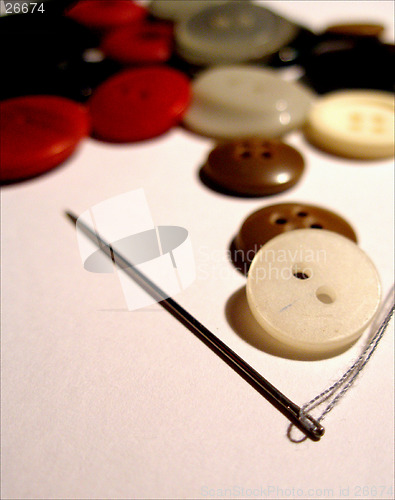 Image of Buttons and needle