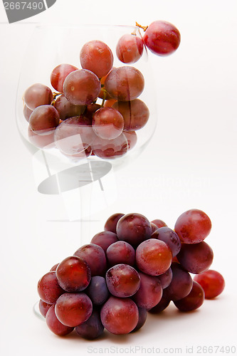 Image of grapes in a wine glass