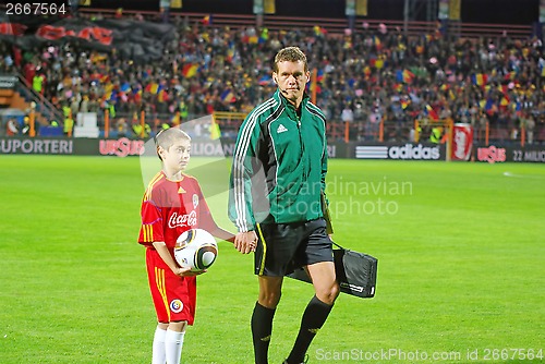 Image of Referee at football game