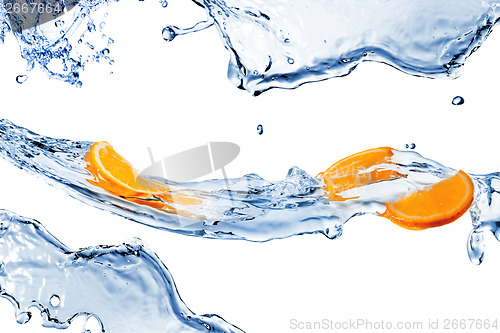 Image of fresh water splashes and orange slices isolated on white