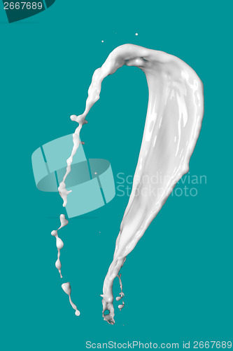 Image of milk splash isolated on blue background