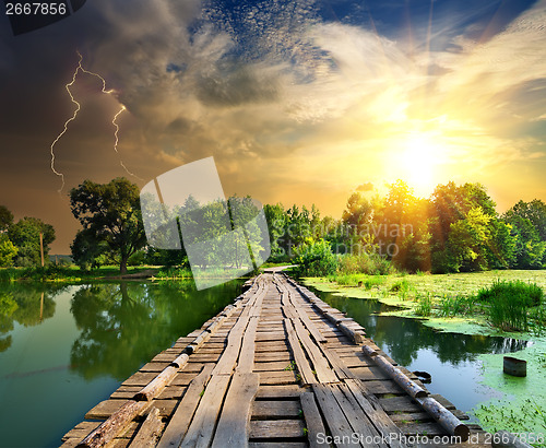 Image of Lightning over the wooden bridge