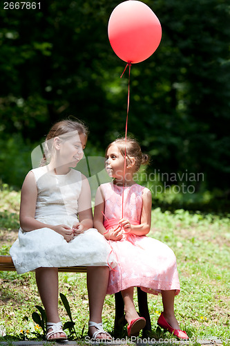 Image of Two girls in park