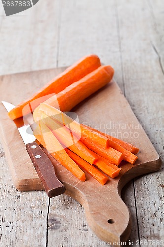 Image of fresh carrot and knife 