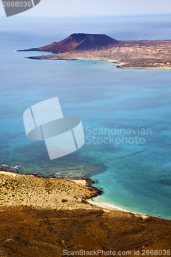 Image of miramar del rio harbor rock stone sky cloud   in lanzarote spain