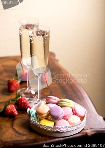 Image of champagne with  macaroons