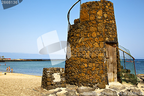 Image of tower s    black rocks in the   lanzarote 