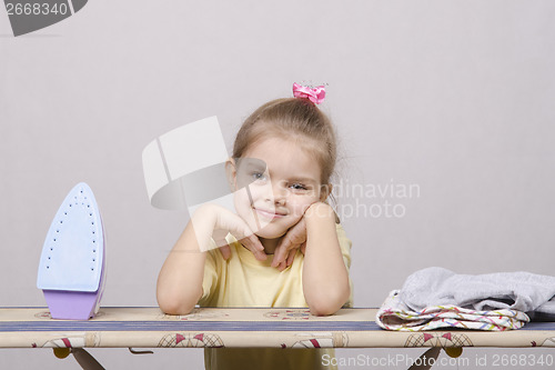 Image of the girl rests after pressing