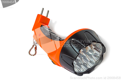 Image of Electric rechargeable led flashlight on a white background.