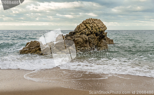 Image of Wave breaking on a rock