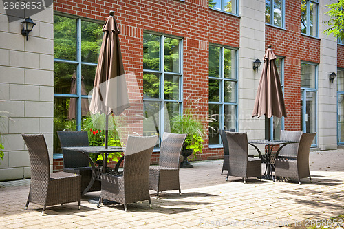 Image of Tables and chairs on outdoor patio