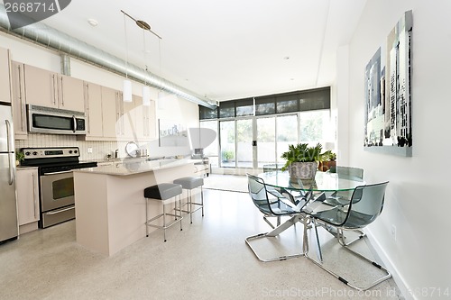 Image of Modern condo kitchen dining and living room