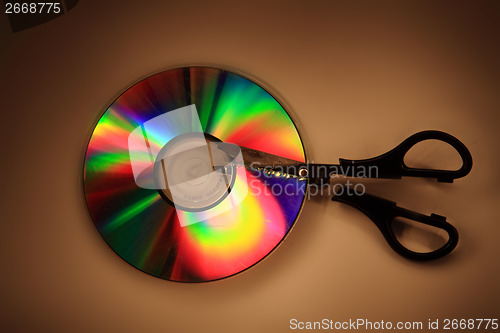 Image of damaged CD or DVD in the dark night