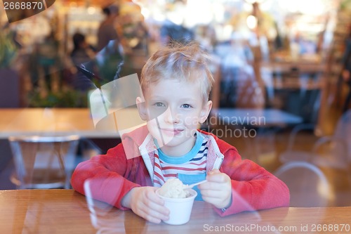 Image of boy eating ice-cream