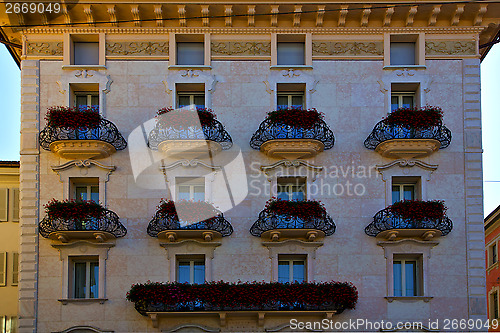 Image of Switzerland Swiss old wall and flower terrace in the   centre lu