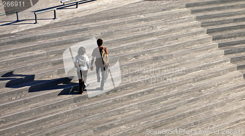 Image of two peoples walking