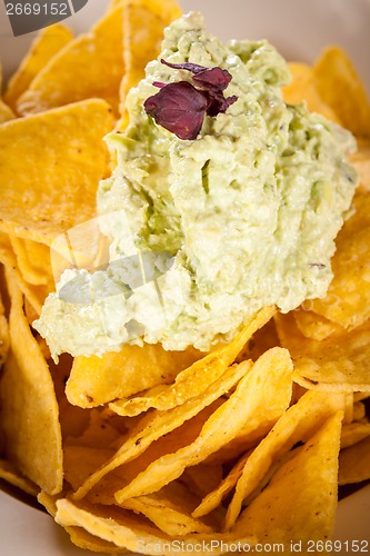 Image of Crisp corn nachos with guacamole sauce