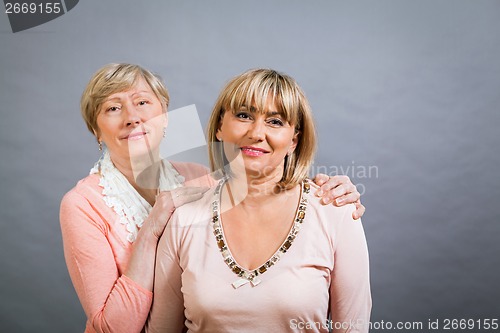 Image of Senior lady with her middle-aged daughter