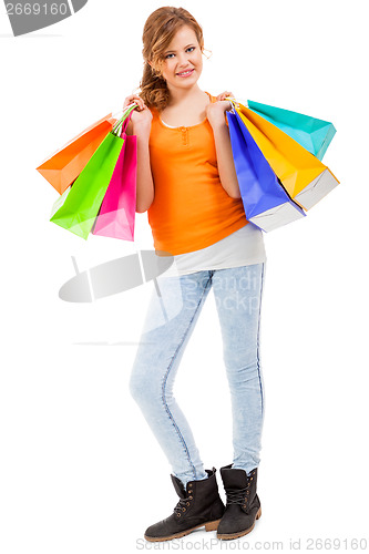 Image of Happy attractive young shopaholic