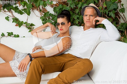 Image of Elegant trendy young couple