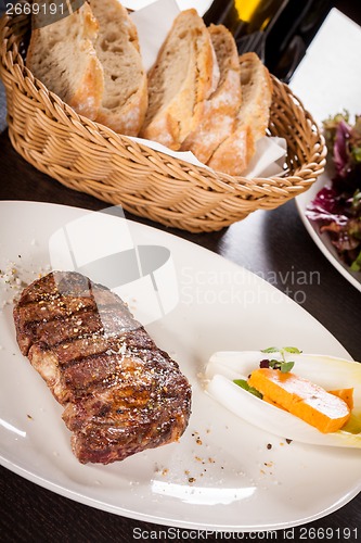 Image of Grilled beef steak with seasoning