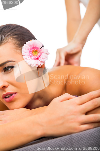 Image of Beautiful woman having a back massage