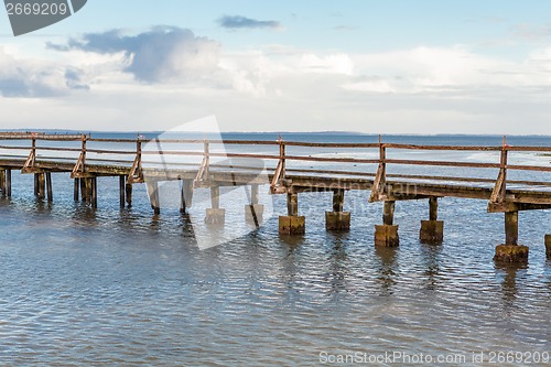 Image of Bridge or pier across an expanse of sea