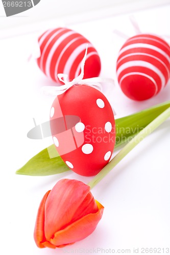 Image of Colourful red Easter still life