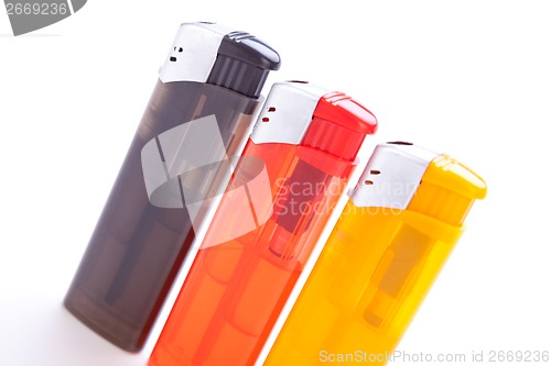 Image of Vividly coloured plastic lighters