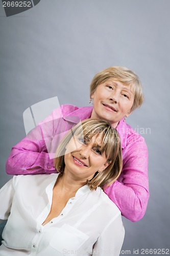 Image of Senior lady with her middle-aged daughter