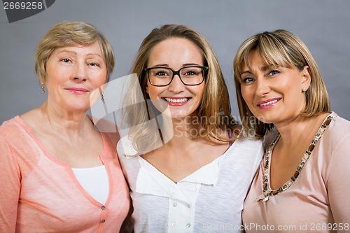 Image of Three generations with a striking resemblance