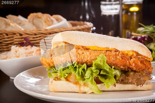 Image of Burger with golden crumbed chicken breast