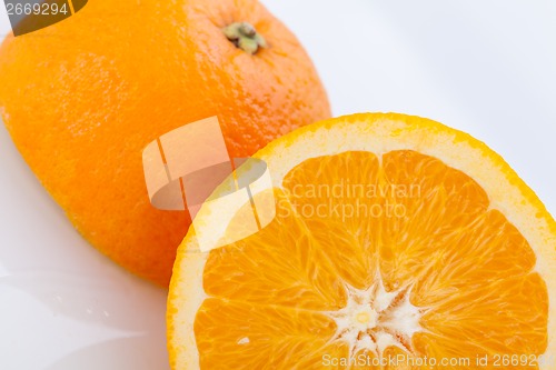 Image of Fresh orange halved to show the pulp