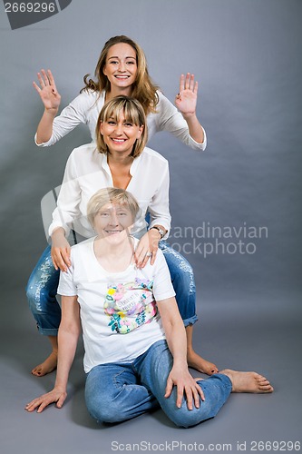 Image of Three generations with a striking resemblance