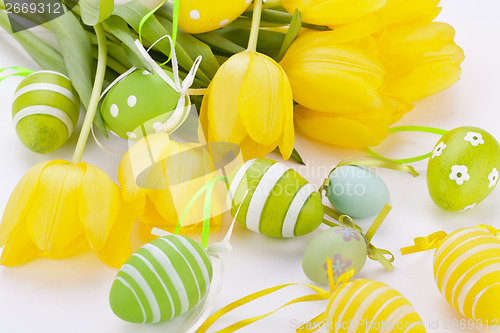 Image of Colourful yellow and green spring Easter Eggs