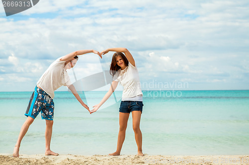 Image of smiling young couple having fun in summer holiday