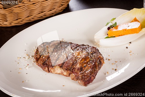 Image of Grilled beef steak with seasoning