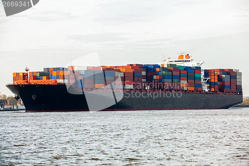 Image of Fully laden container ship in port