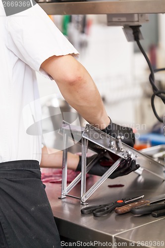 Image of Chef slicing boiled beetroot