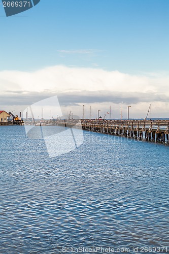 Image of Bridge or pier across an expanse of sea