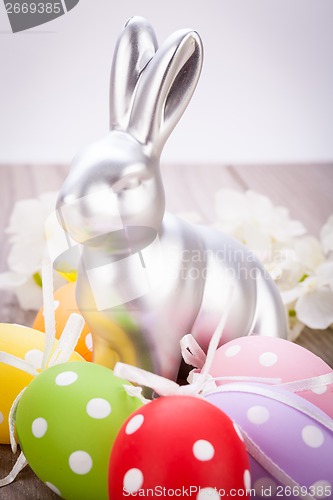 Image of Easter still life with a silver bunny and eggs