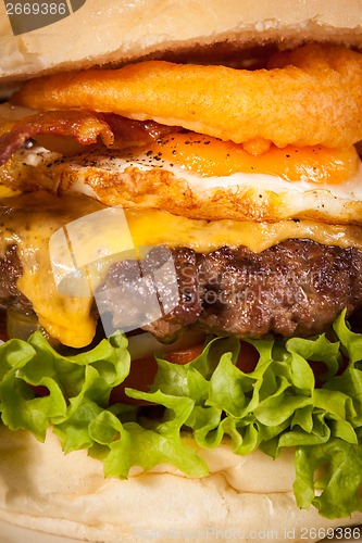 Image of Delicious egg and bacon cheeseburger