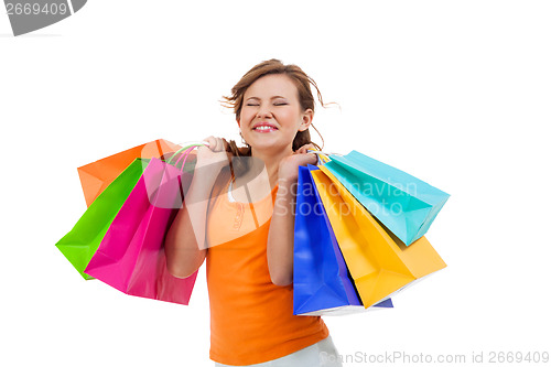 Image of Happy attractive young shopaholic