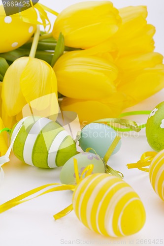 Image of Colourful yellow and green spring Easter Eggs