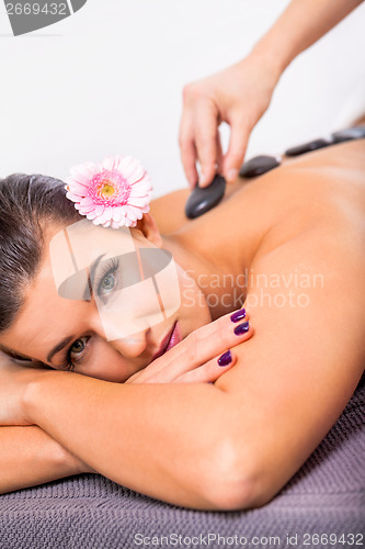 Image of Beautiful woman having a back massage