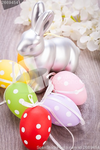 Image of Easter still life with a silver bunny and eggs