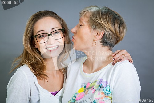 Image of Loving grandmother and granddaughter